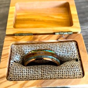 Men’s size 11.5 ring.